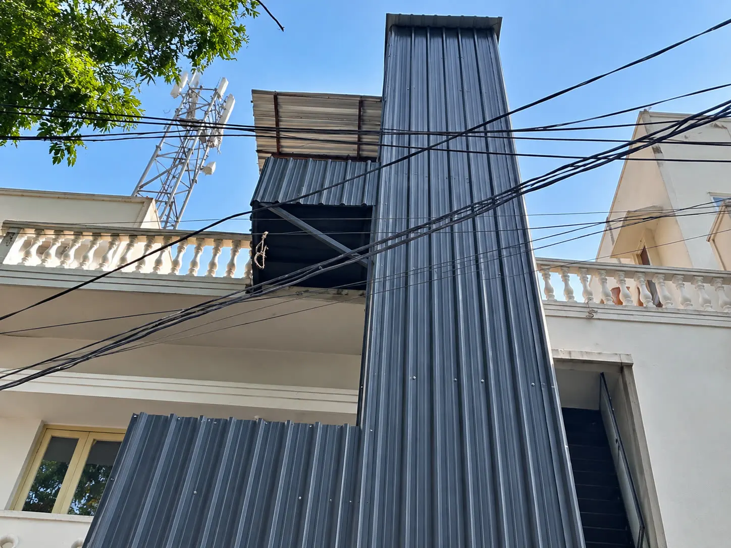 Metal-clad exterior home lift shaft